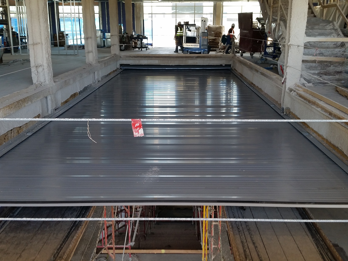 custom fire rated shutter being installed